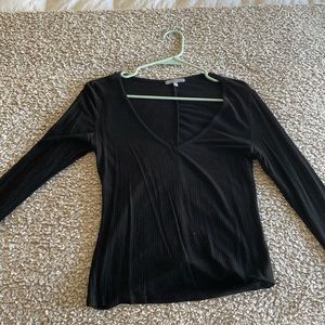 Black, size small, tight long sleeve black top with V neck